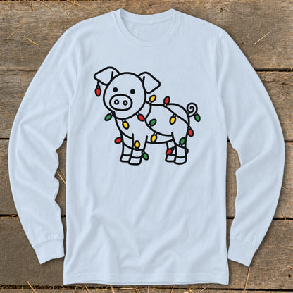 A light blue long-sleeve shirt featuring a black outline of a pig wrapped in colorful Christmas lights.