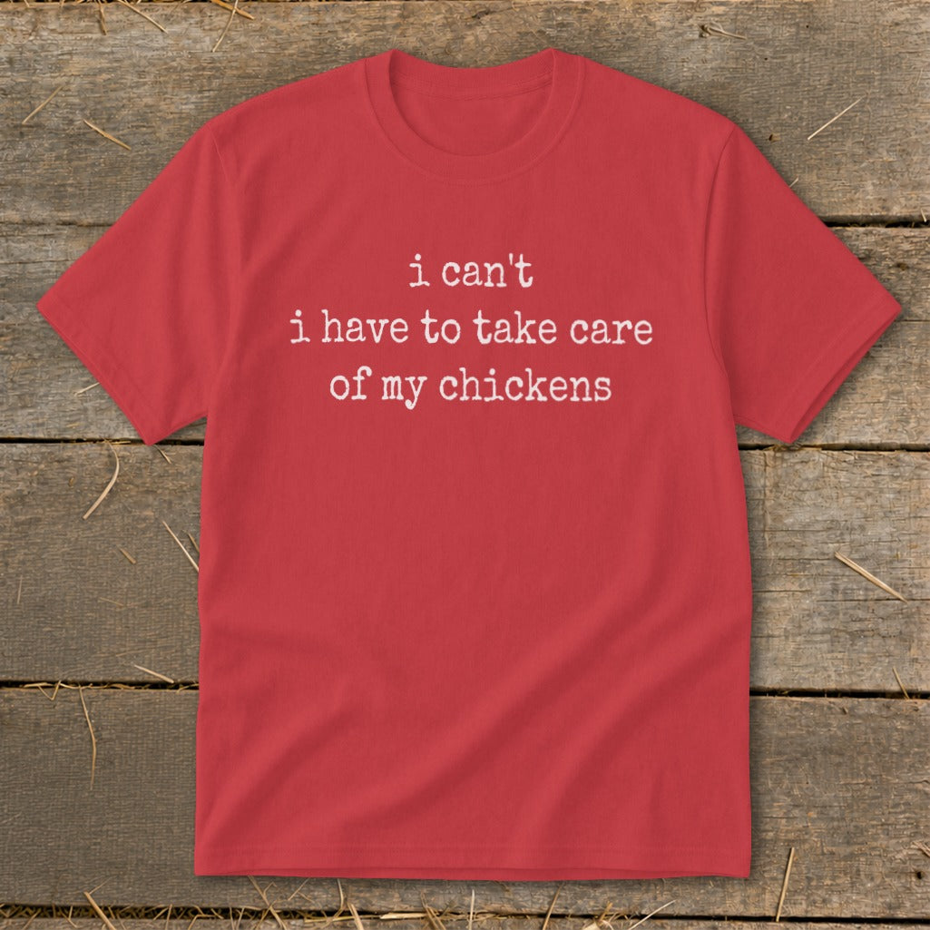 Red t-shirt with white text "i can't i have to take care of my chickens".