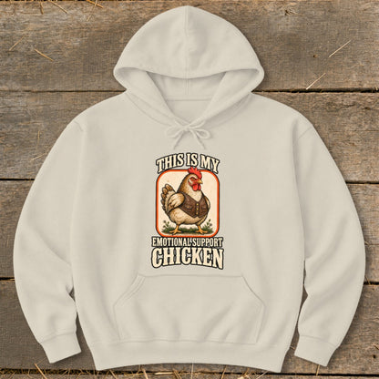 Cream hoodie with "This is my emotional support chicken" text and chicken graphic.
