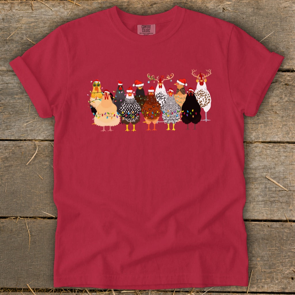 Group of festive chickens wearing Santa hats and Christmas lights.
