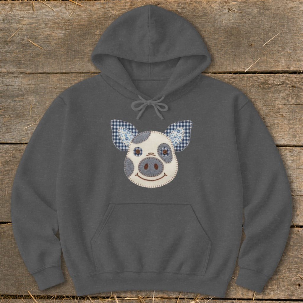 Dark grey hoodie with a stitched pig face applique and checkered ears.