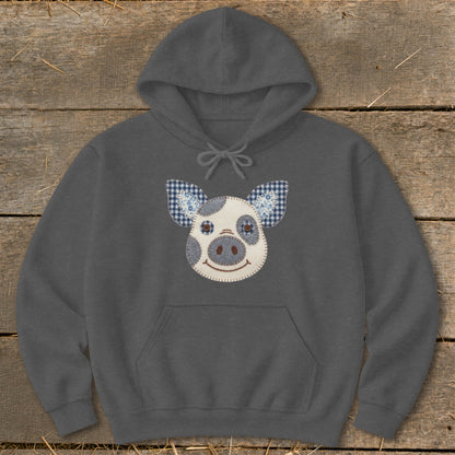 Dark grey hoodie with a stitched pig face applique and checkered ears.