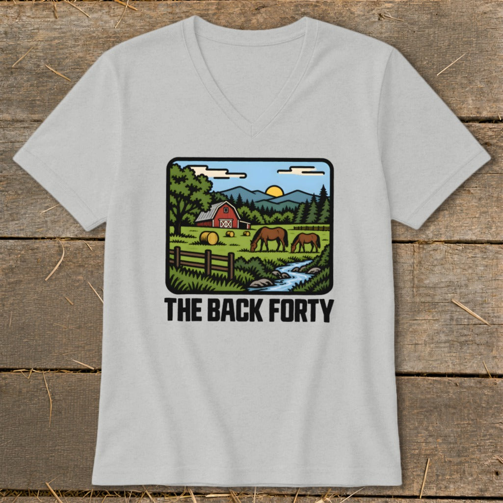 Light gray V-neck t-shirt featuring a farm graphic with horses, a red barn, and text reading The Back Forty.