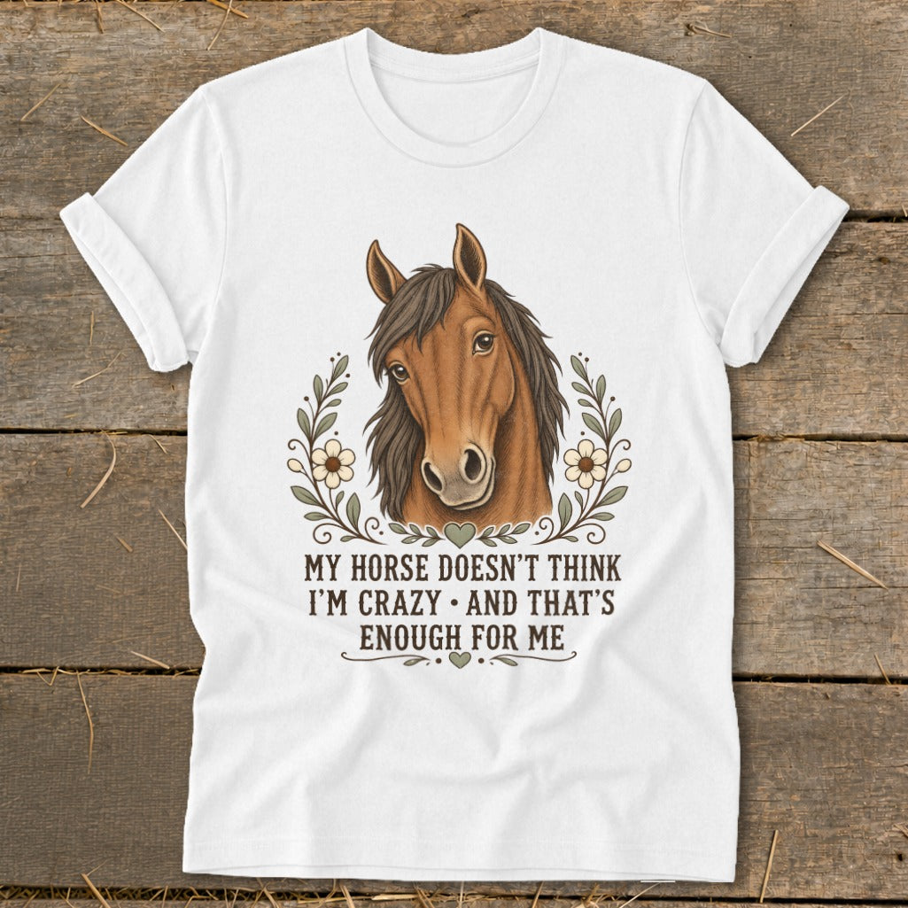 White t-shirt with horse illustration and text "MY HORSE DOESN'T THINK I'M CRAZY AND THAT'S ENOUGH FOR ME".