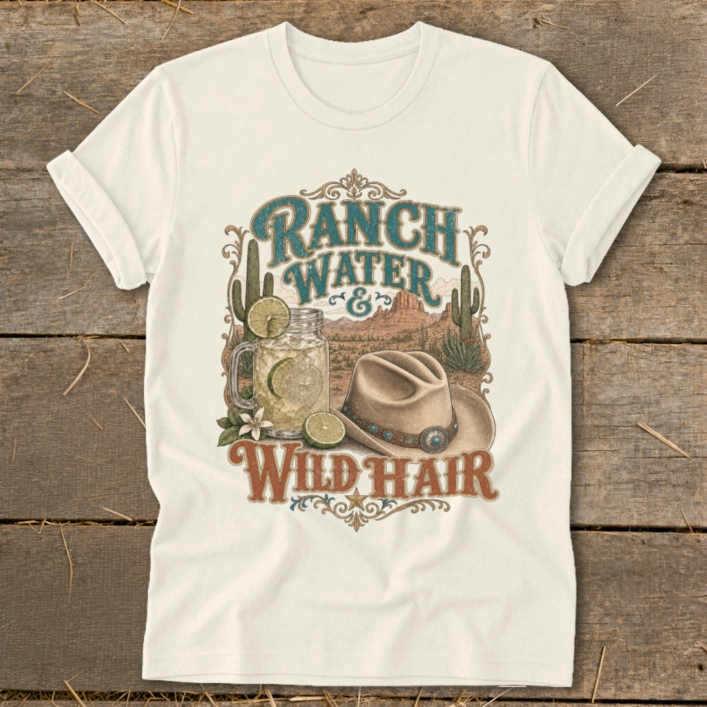 Ranch water and wild hair graphic on a cream t-shirt featuring a sombrero and desert landscape.