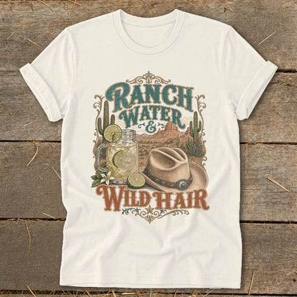 Ranch water and wild hair graphic on a cream t-shirt featuring a sombrero and desert landscape.
