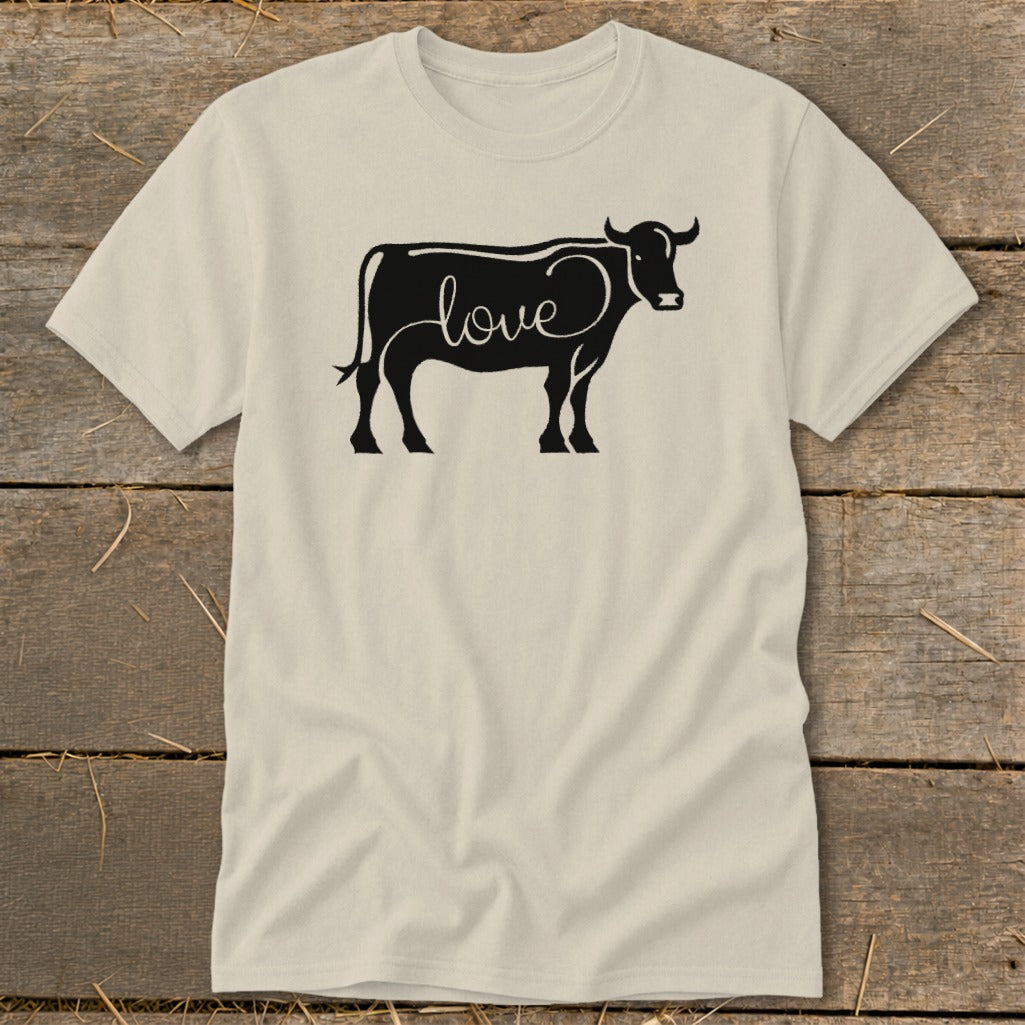 Light tan t-shirt with black outline of a cow with the word "love" inside.