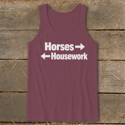 A maroon women's tank top with white text that reads Horses with a right-pointing arrow above Housework with a left-pointing arrow.