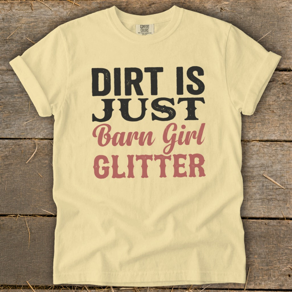 Cream t-shirt with black and pink text reading "Dirt is Just Barn Girl Glitter".