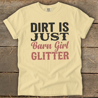 Cream t-shirt with black and pink text reading "Dirt is Just Barn Girl Glitter".