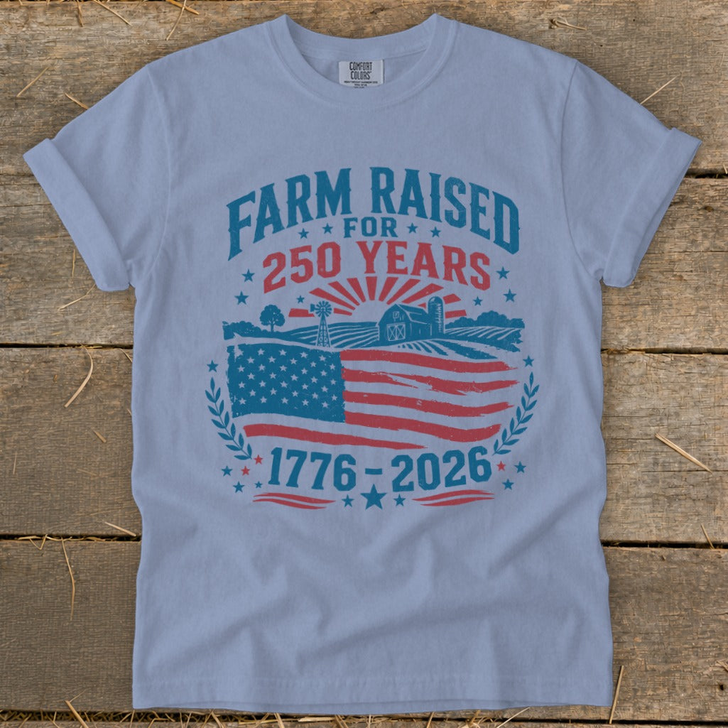 Light blue t-shirt with "Farm Raised For 250 Years" and American flag graphic.