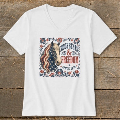 White v-neck t-shirt with patriotic horse graphic and text "Hoofbeats & Freedom Since 1776".