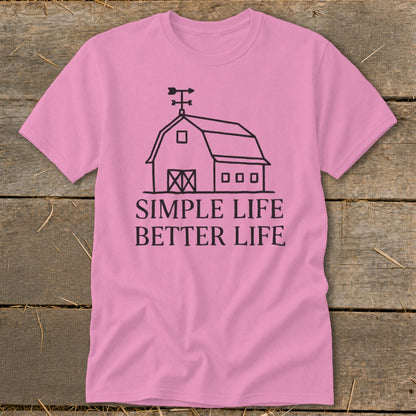 Pink t-shirt with black line art of a barn and text "SIMPLE LIFE BETTER LIFE".