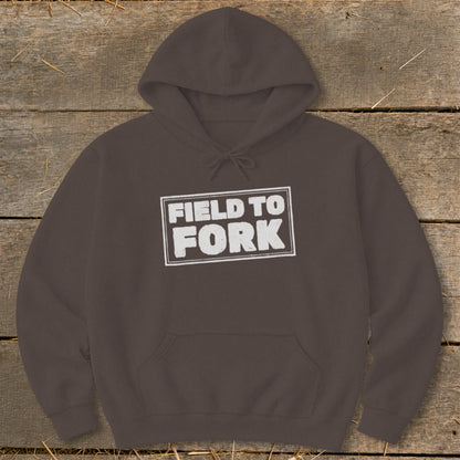 Dark brown hoodie with a front kangaroo pocket and the white text FIELD TO FORK centered on the chest.