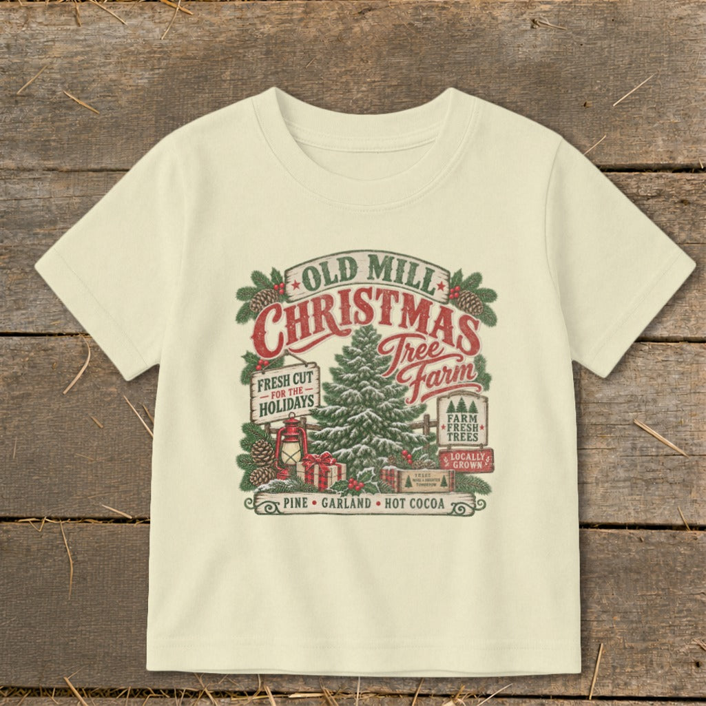 Cream t-shirt with Old Mill Christmas Tree Farm graphic and holiday phrases.