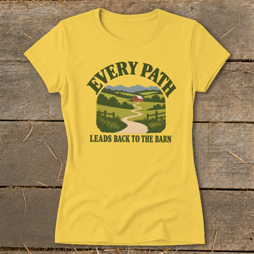 Yellow t-shirt with a landscape graphic and text "EVERY PATH LEADS BACK TO THE BARN".