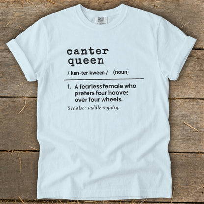 Light blue t-shirt with "canter queen" definition: fearless female who prefers four hooves.