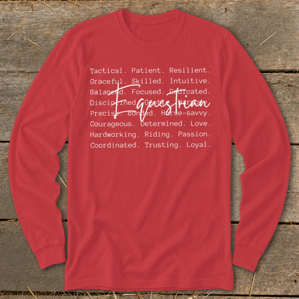 Red long-sleeved shirt with white text listing qualities of an equestrian.