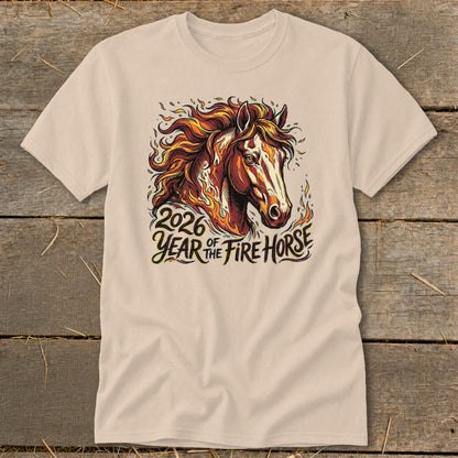 Light tan t-shirt with a fire horse graphic and "2026 Year of the Fire Horse" text.