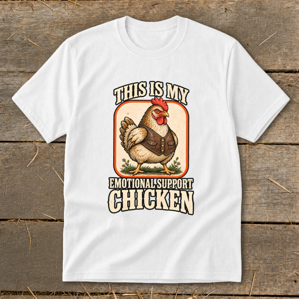 White t-shirt with graphic of a chicken wearing a vest, text says "This is my emotional support chicken."