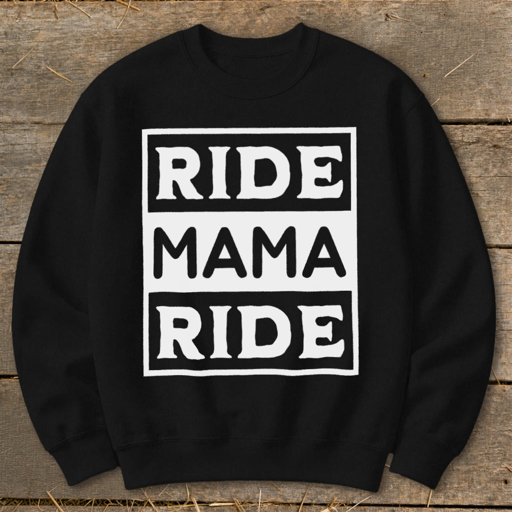 Black sweatshirt with white text reading "RIDE MAMA RIDE" in a box.