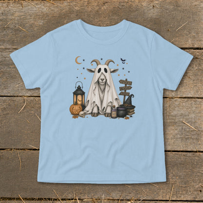 Light blue t-shirt with a goat dressed as a ghost, surrounded by Halloween decor.