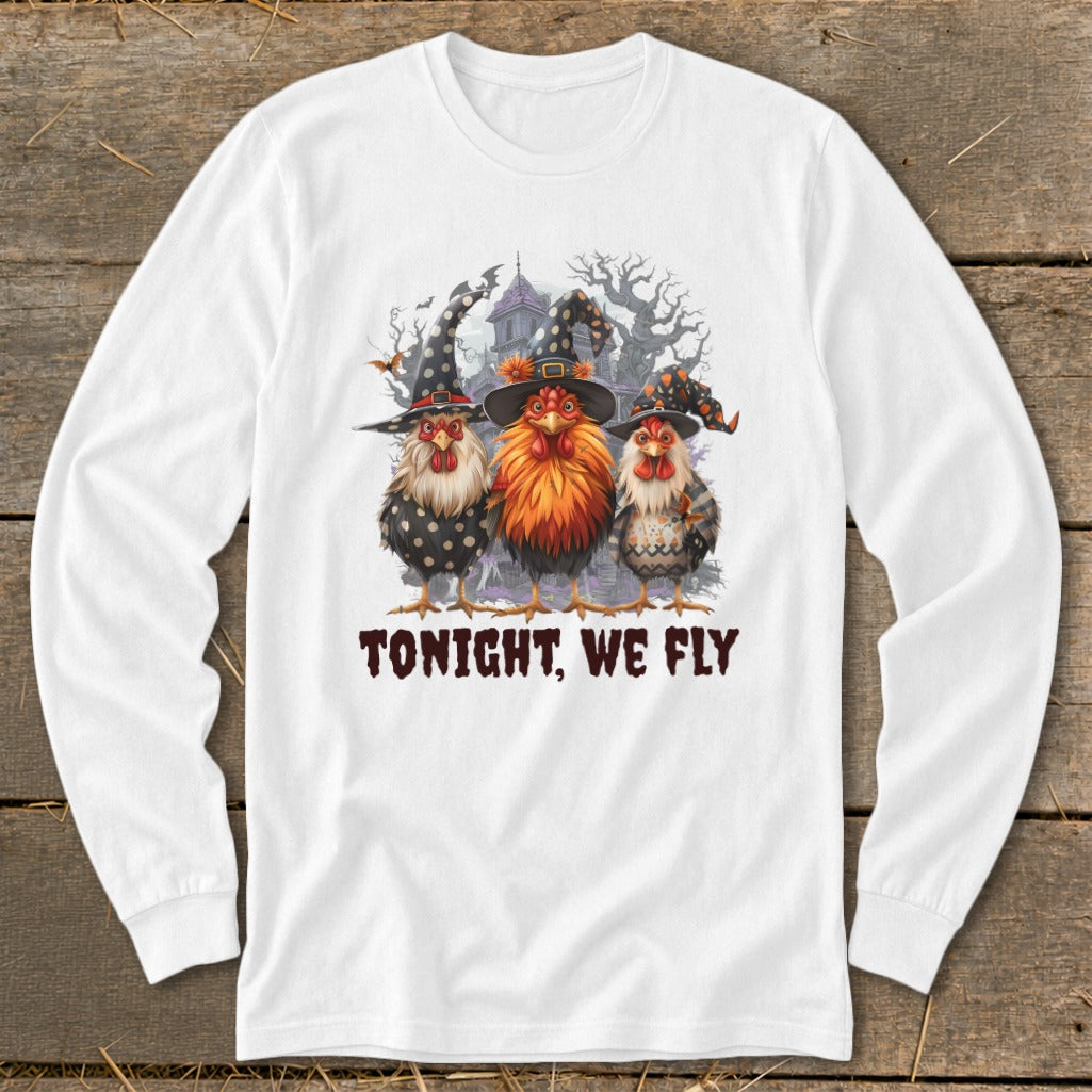 Three chickens in witch hats with text "TONIGHT, WE FLY" below.