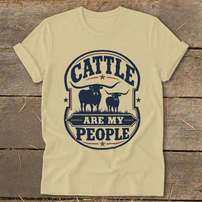Cream t-shirt with "Cattle Are My People" text and two longhorn cattle graphics.