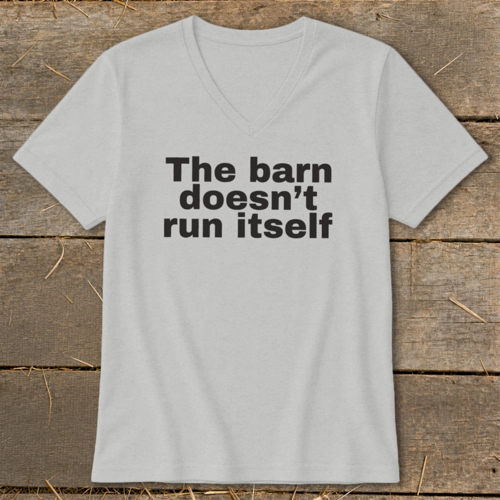 Light grey v-neck t-shirt with black text: "The barn doesn't run itself".