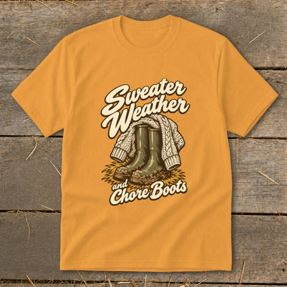 Orange t-shirt with "Sweater Weather and Chore Boots" graphic featuring boots and sweater.