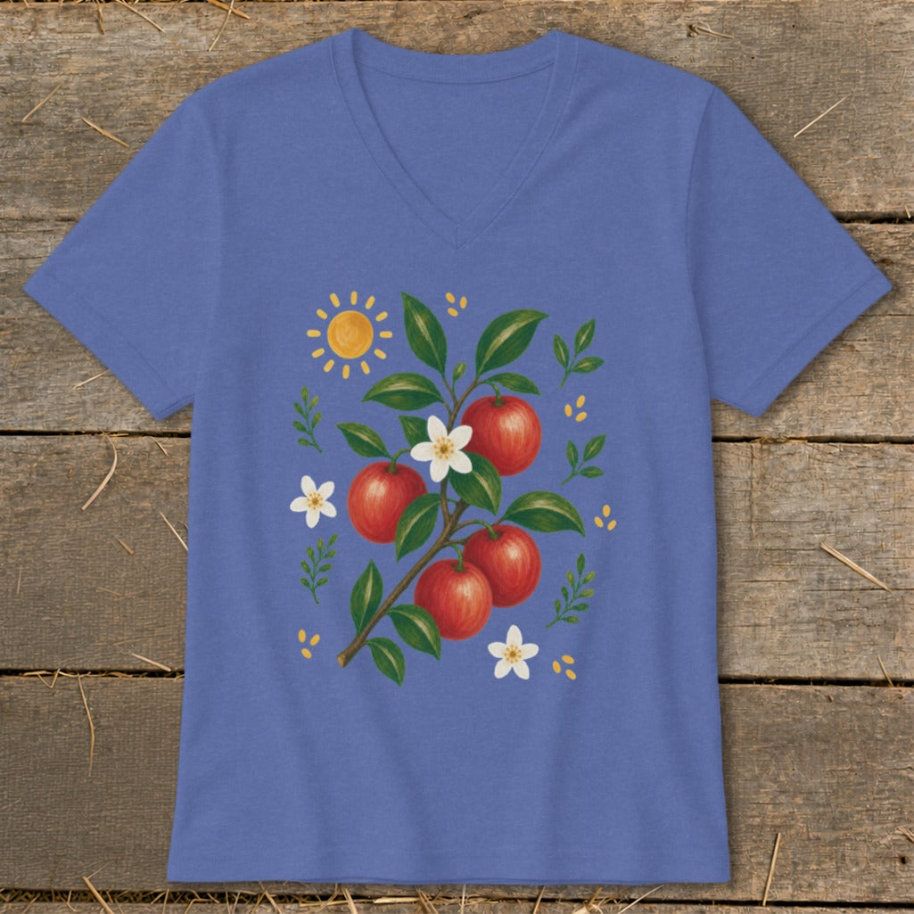 Purple t-shirt with apple branch, sun, and flowers illustration.