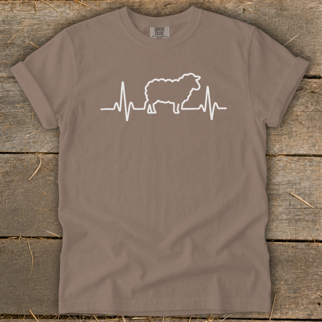 Brown crewneck t-shirt with a white graphic of a sheep integrated into a heartbeat line.