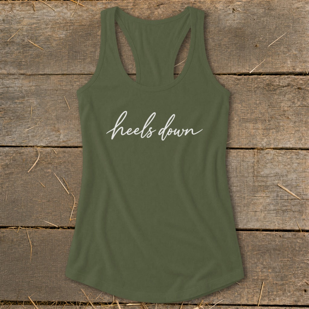 Olive green tank top with white "heels down" script text.