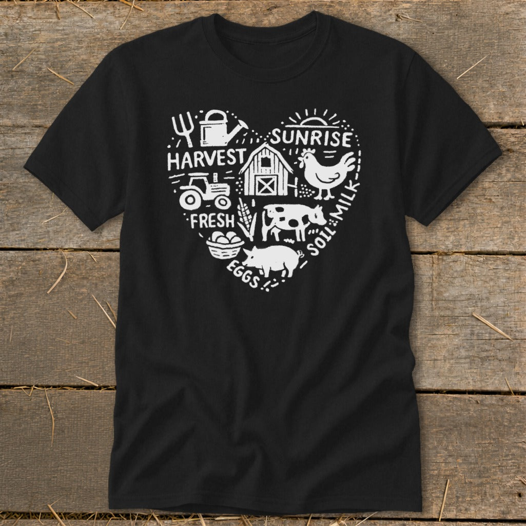 Black t-shirt with white heart-shaped farm graphic featuring tractor, barn, chicken, cow, pig, and words.