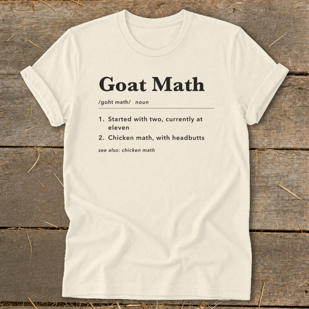 Cream t-shirt with "Goat Math" definition printed in black text.