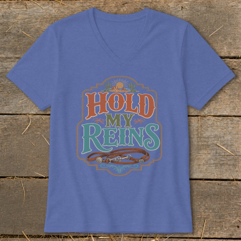 Blue v-neck t-shirt with "Hold My Reins" text and horse bridle graphic.