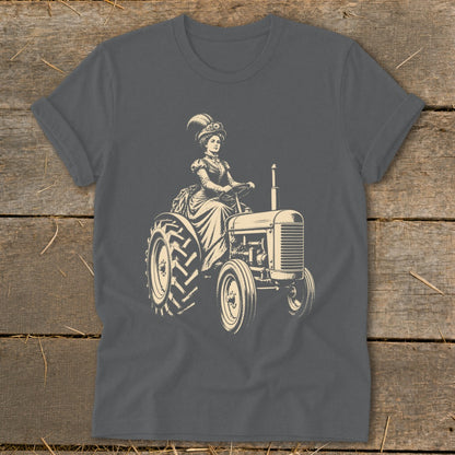 Woman in vintage attire driving a tractor with detailed front grille and tires.