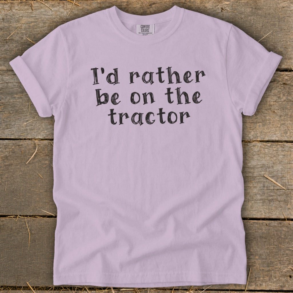 Lavender t-shirt with black text "I'd rather be on the tractor".