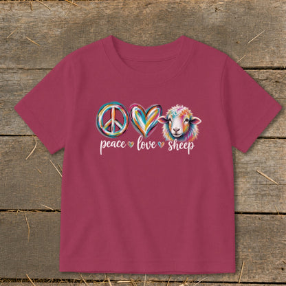 Children's t-shirt with peace, heart, and sheep graphic reading "peace love sheep".