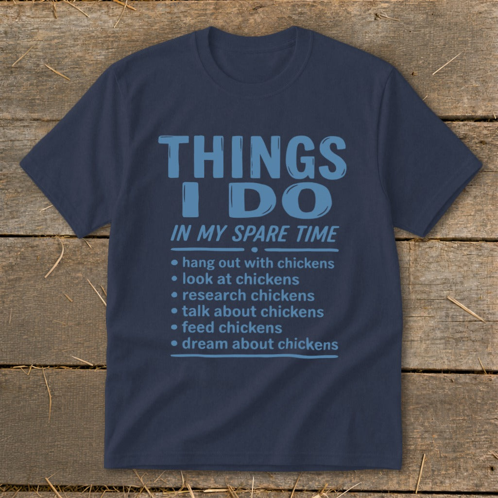 Navy t-shirt with blue text "Things I Do In My Spare Time" and chicken-related activities.