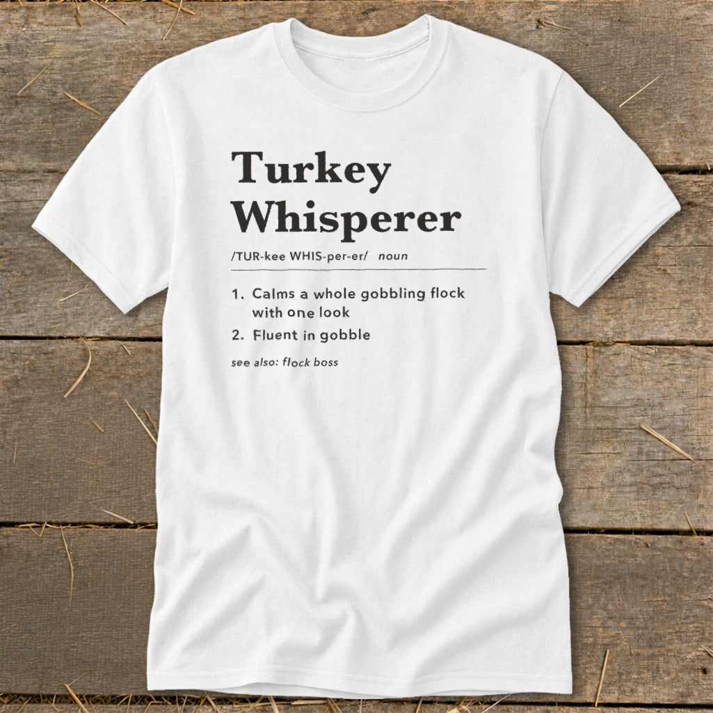 White t-shirt with "Turkey Whisperer" definition and humorous text.