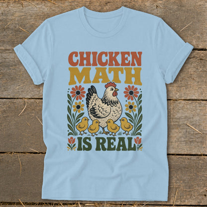 Light blue t-shirt with "CHICKEN MATH IS REAL" text and chicken family illustration.