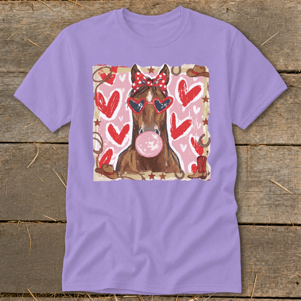Horse wearing heart sunglasses and bandana blows bubblegum on pink heart background.