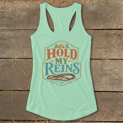 Mint green tank top with "Hold My Reins" text and horse reins graphic.