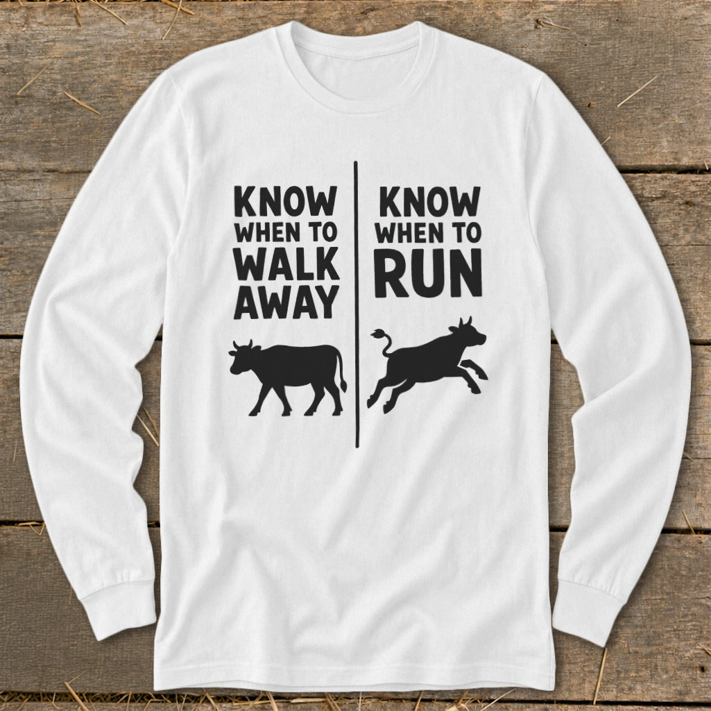 White long-sleeve shirt with "Know When to Walk Away" and "Know When to Run" text and cow graphics.