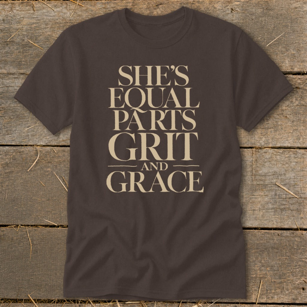 Brown t-shirt with "She's Equal Parts Grit and Grace" text in beige.