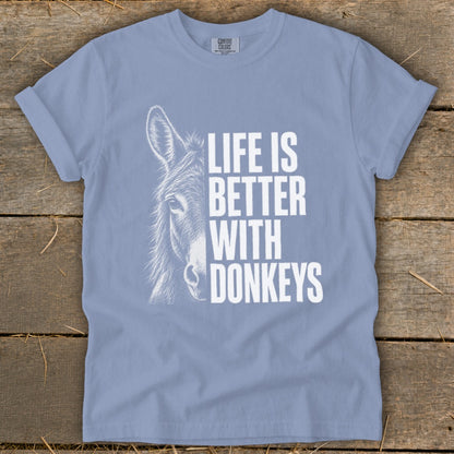 Light blue t-shirt with white graphic of donkey and text "Life is Better With Donkeys".