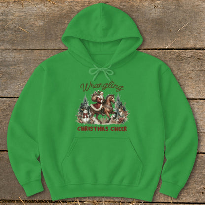 Green hoodie with "Wrangling Christmas Cheer" text and Santa on a horse design.