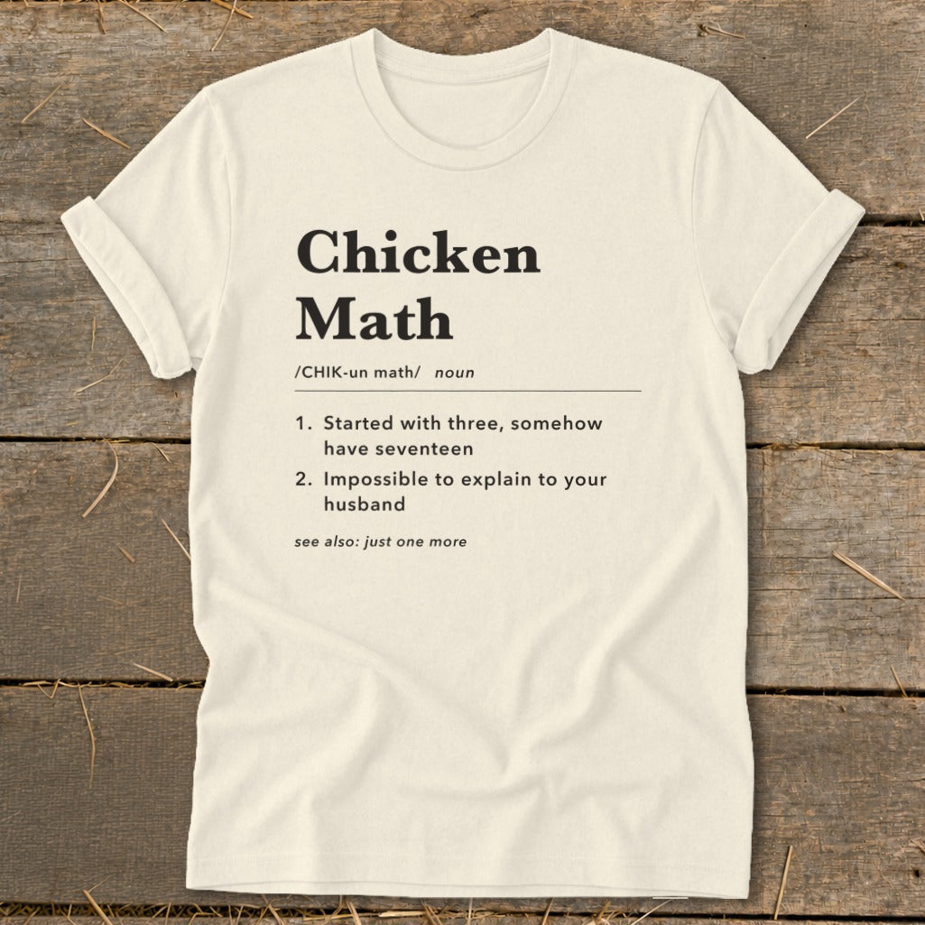 Cream t-shirt with "Chicken Math" definition and humorous phrases.