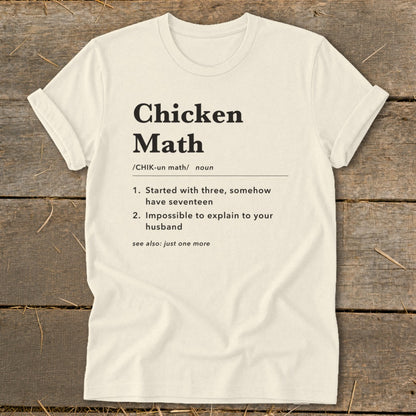 Cream t-shirt with "Chicken Math" definition and humorous phrases.
